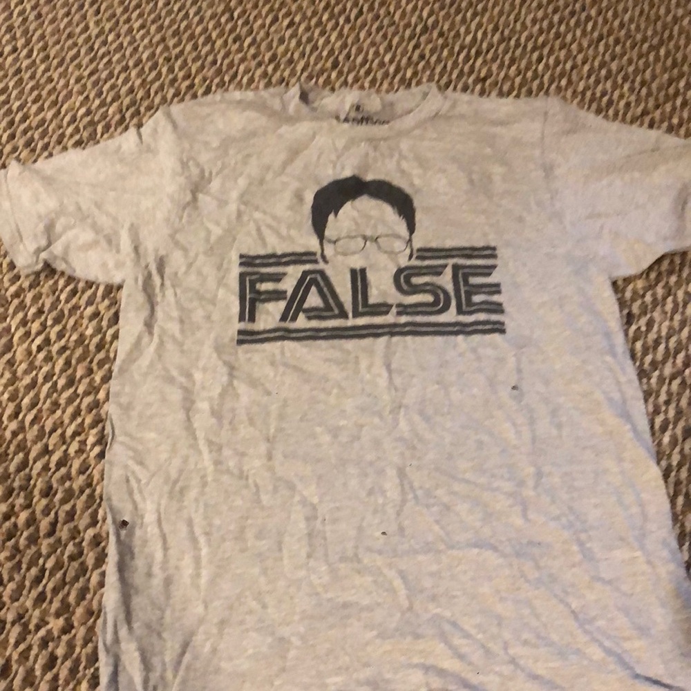 dwight t shirt. (spots from camera)